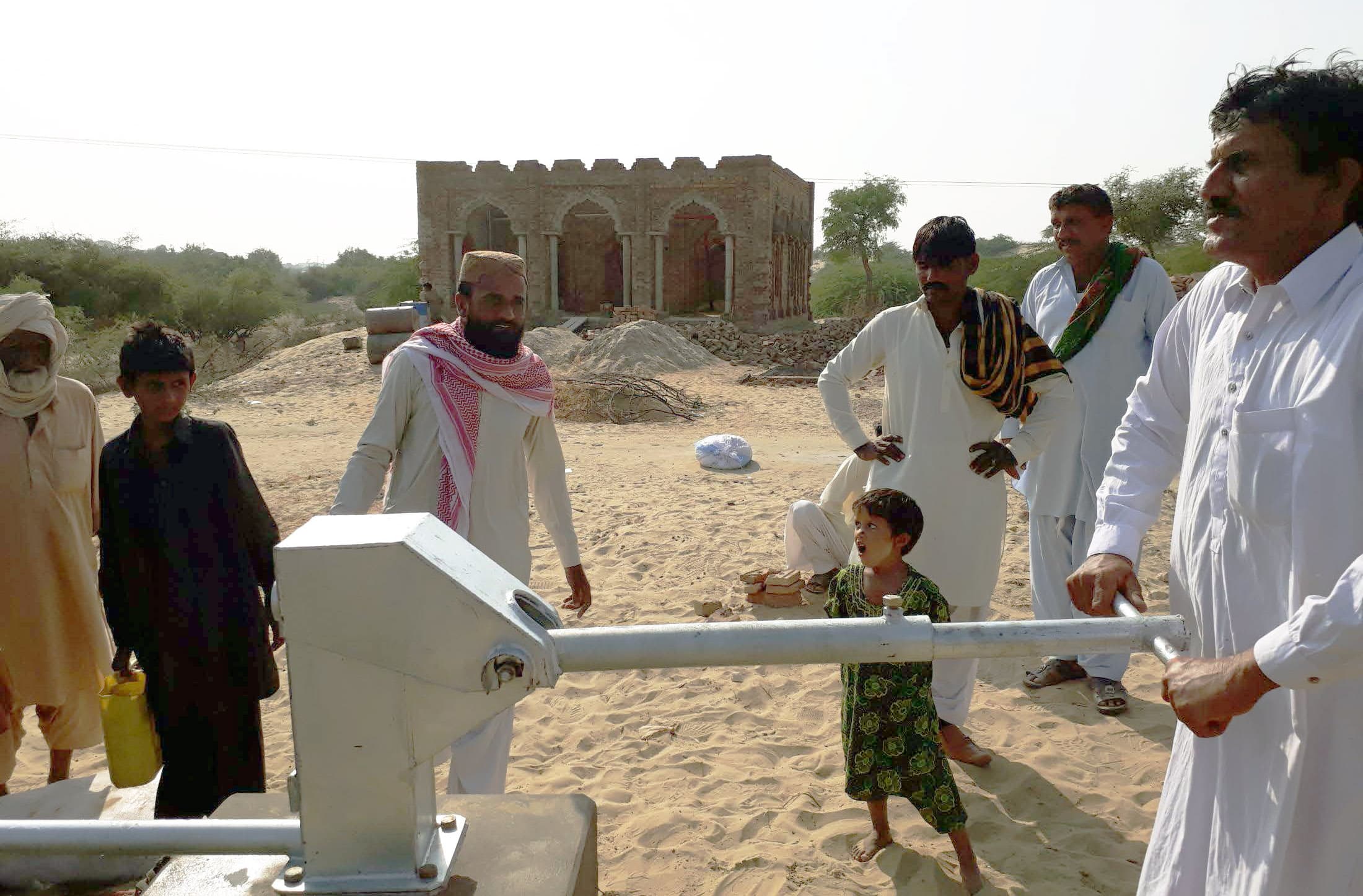 Village residents using new well